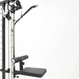 Force USA Lateral Row Seat attached to an all-in-one rowing trainer.
