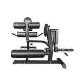 Force USA quadriceps and leg curl machine with adjustable padding and a sturdy steel frame for versatile leg training.
