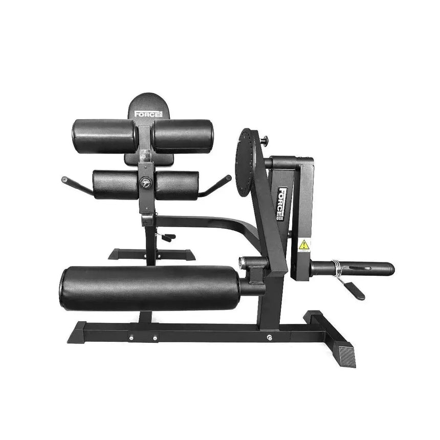 Force USA quadriceps and leg curl machine with adjustable padding and a sturdy steel frame for versatile leg training.
