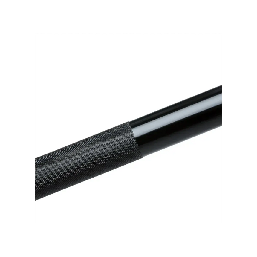 Force USA The Gunner Olympic Bar – 2.20m long, black barbell with silver sleeves and precise knurling.
