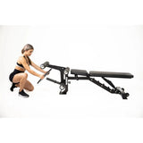 Force USA MyBench V2 – Adjustable training bench with bicep curl and leg development attachments.

